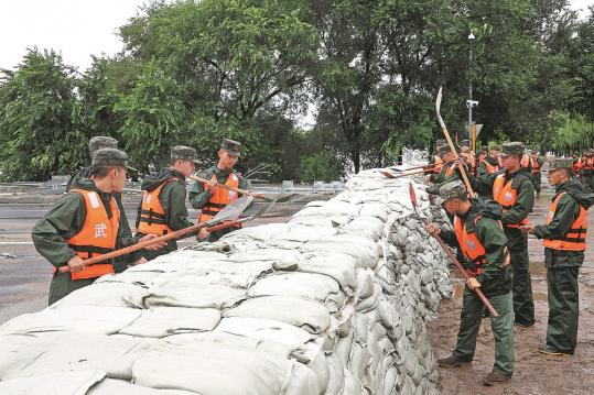 Temporary shelters house deluge victims